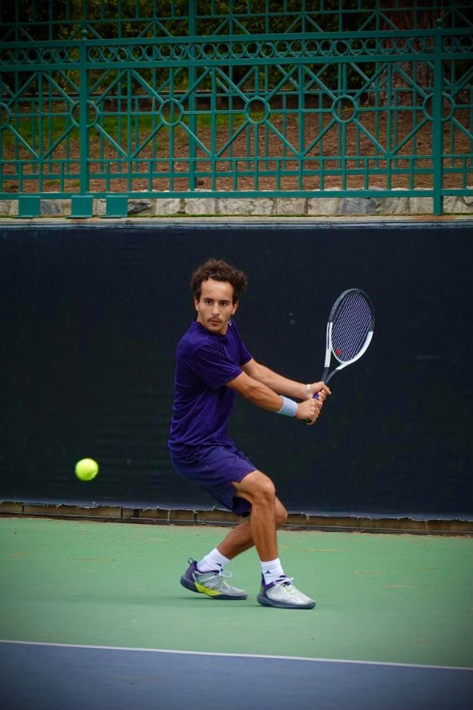 Markos hitting a powerful backhand