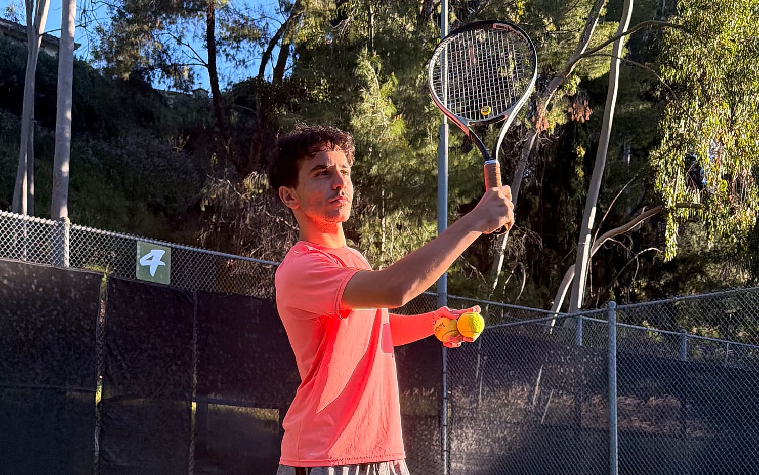 Markos Mkrtchyan, head tennis coach in Pasadena, on court during a lesson