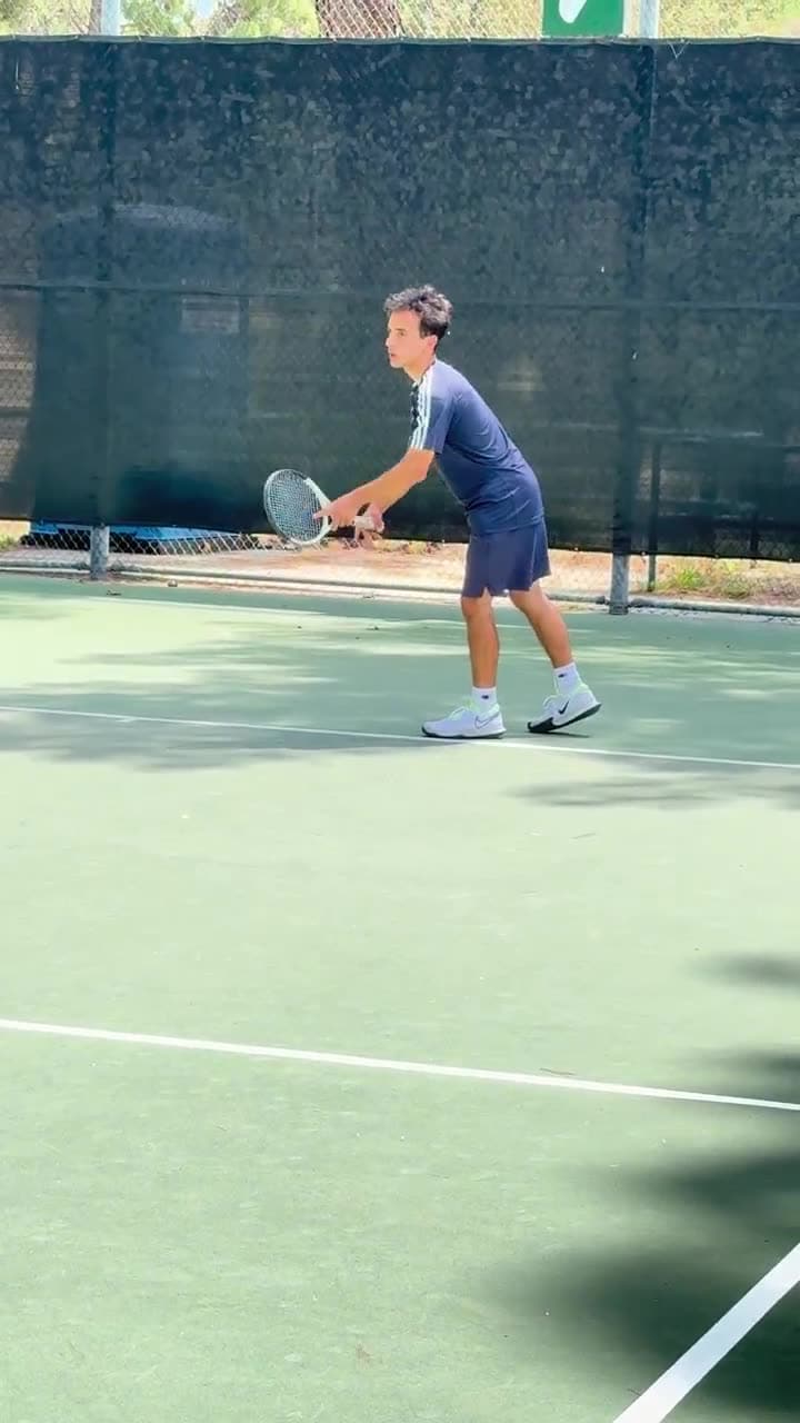 Slow-motion footage of Markos Mkrtchyan hitting a groundstroke on a Los Angeles tennis court